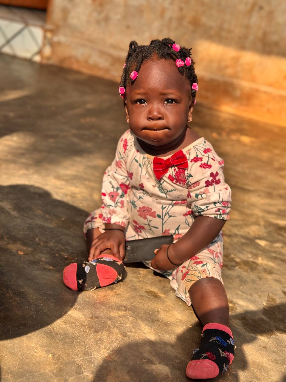 Portrait of Patience, age 2, waiting for a sponsor