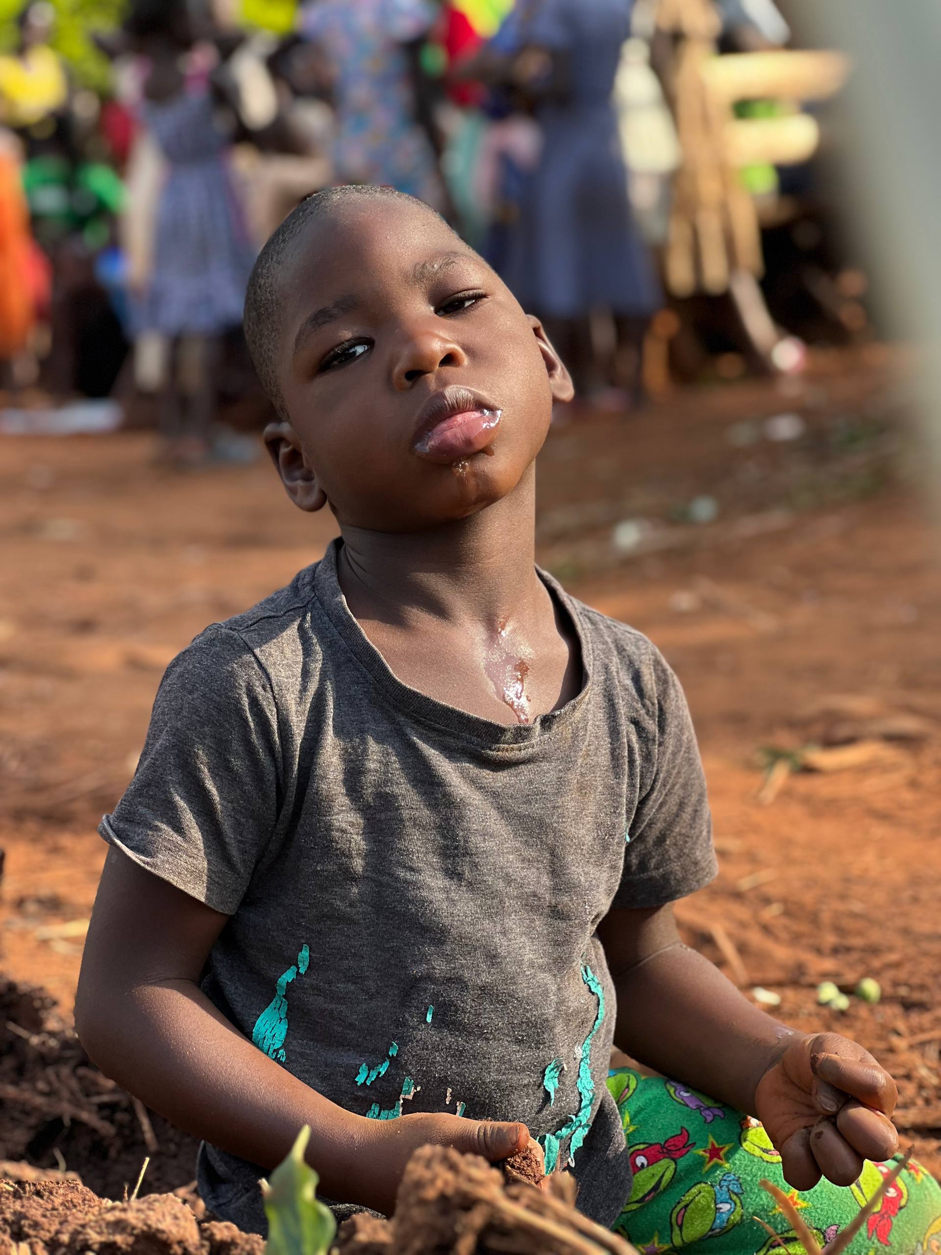 Portrait of Victor, age 10, waiting for a sponsor